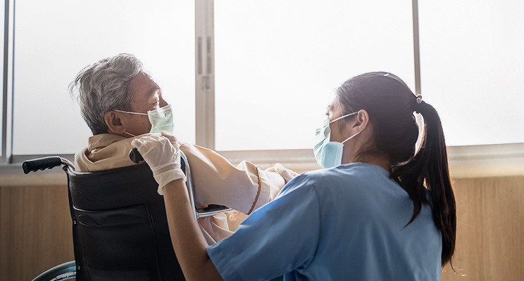 Dad holding daughter
