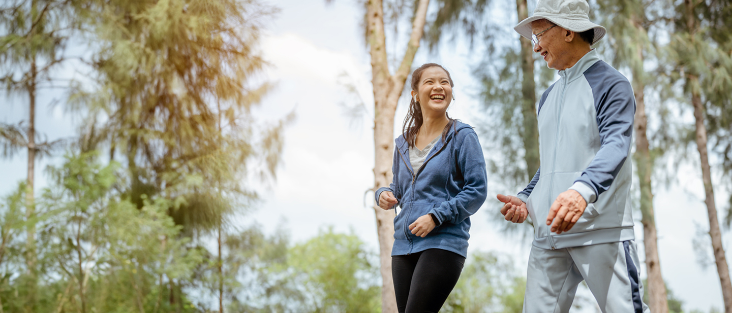 old man and younger woman going for a walk